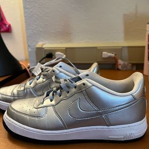 Silver Nike Air Force Ones (6.5 Men’s or 8/8.5 in Women’s)